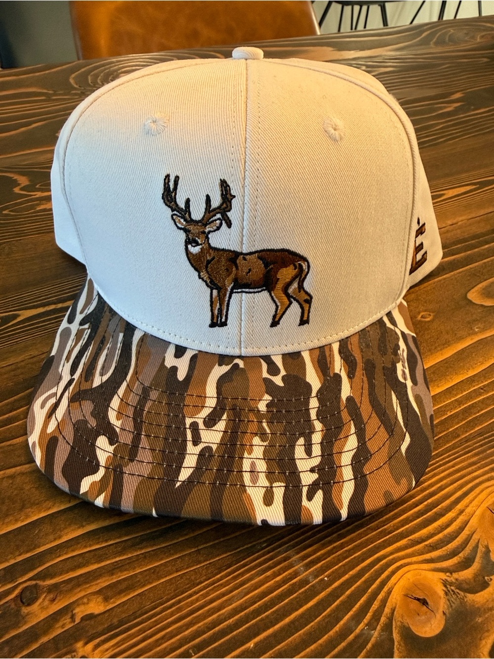 Embry Outdoors Men's White and Brown Camo Deer Embroidered Snapback Hat